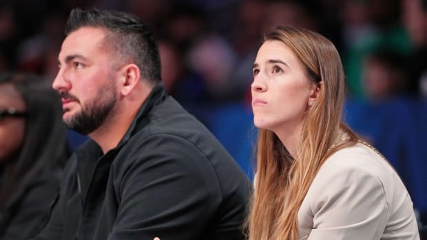 Raiders center Hronnis Grasu and Liberty star Sabrina Ionescu attend the NBA All-Star Game.